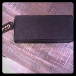 Black clutch with heart earrings